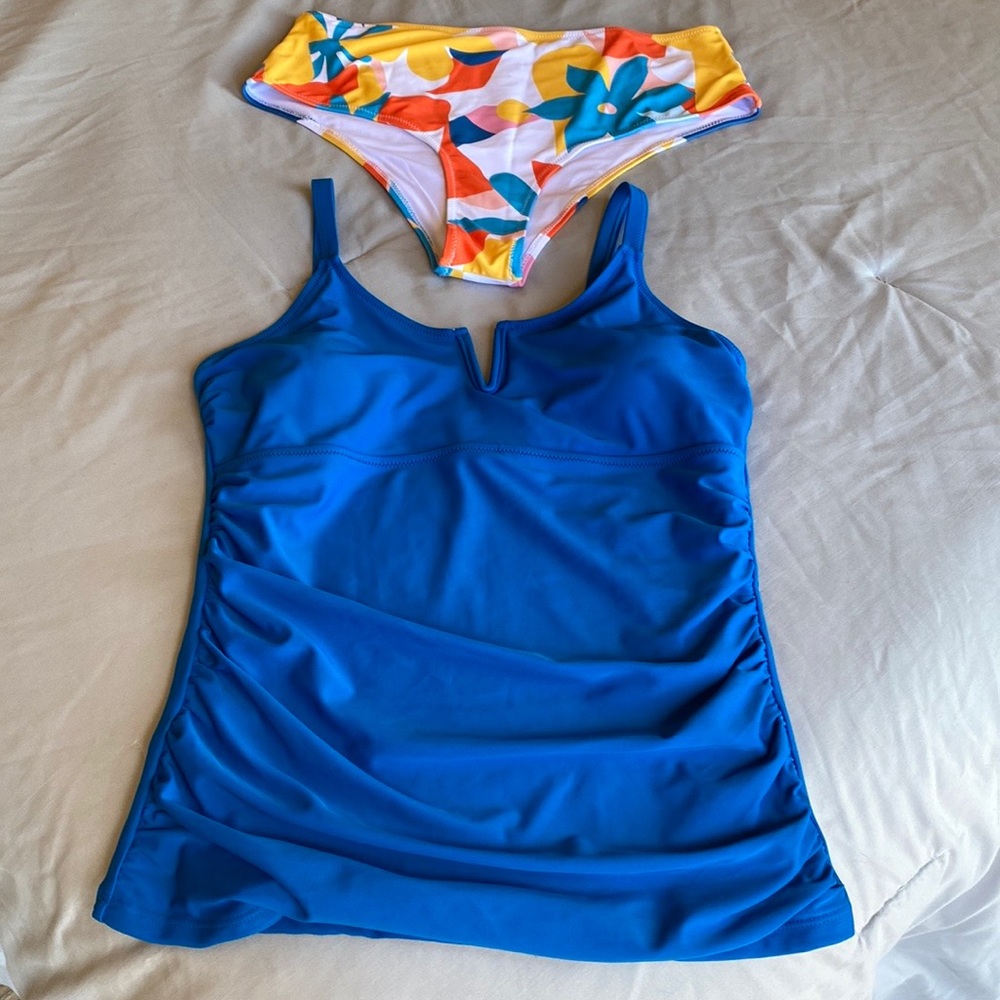 Beachsissi blue tankini with multicolored, high waisted bottoms. Size large. NWT